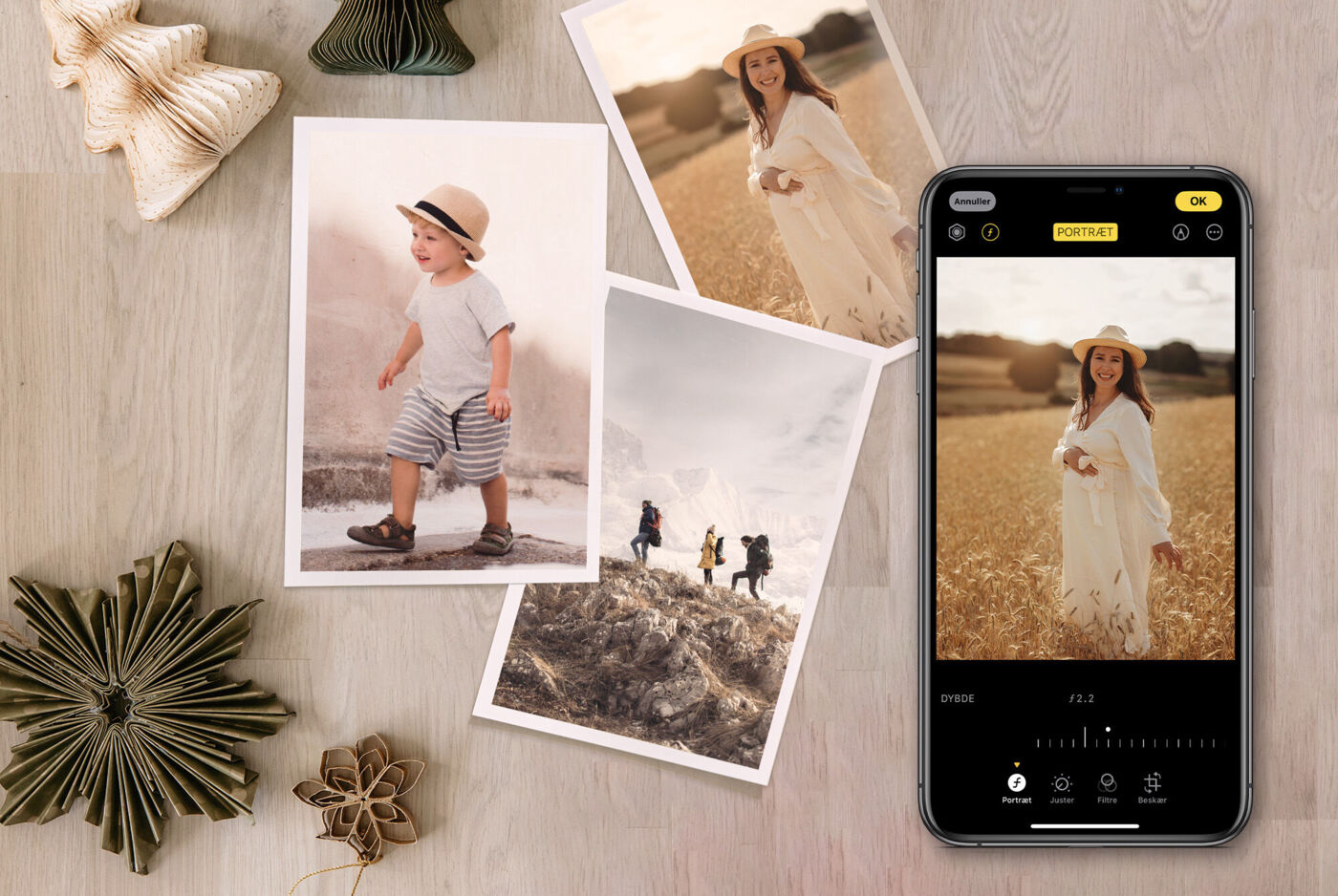 Et mobilt fotografi-interface viser en farverig eng og en kvinde med en hat.