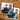 To save the date-kort med billeder af to mænd med armene om hinanden ligger på et træbord